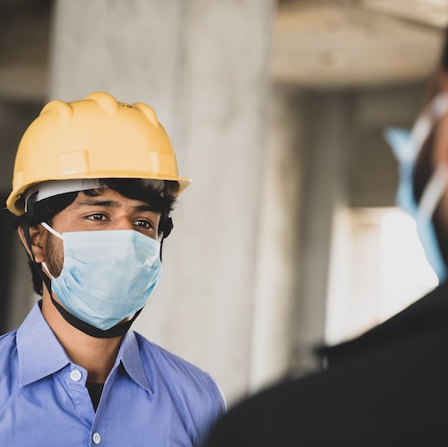 Construction worker wearing a face mask