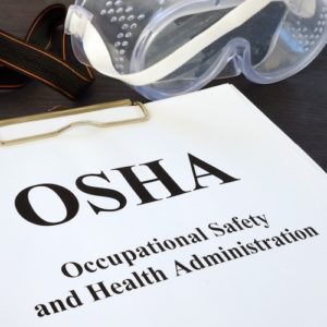 OSHA document on a clip board